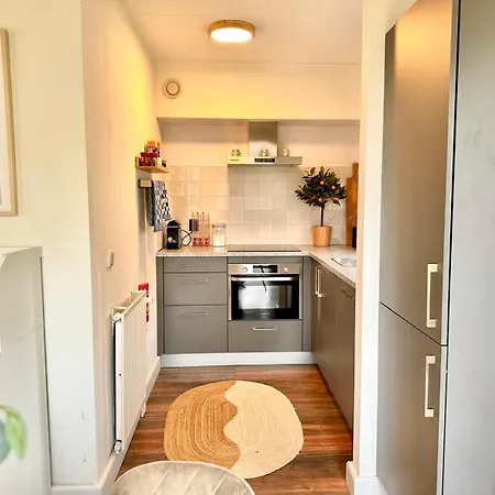 Holiday home 6pers Boshuis -hottub Jacuzzi- 'de Groene Specht' Ewijk