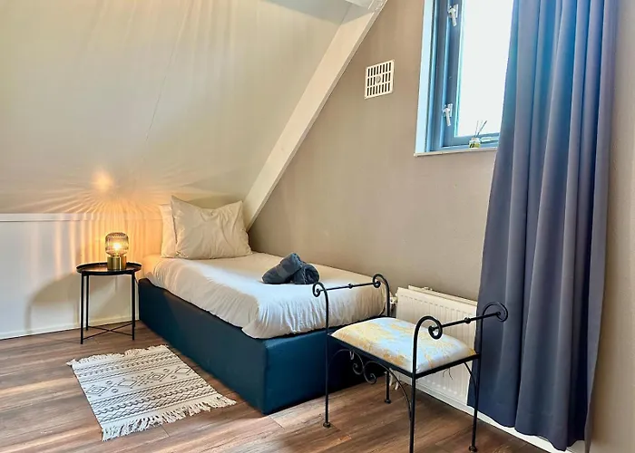 Dom wakacyjny 6pers Boshuis -hottub Jacuzzi- 'de Groene Specht' Ewijk